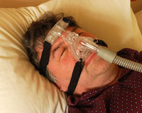 CPAP machine anti-snoring device